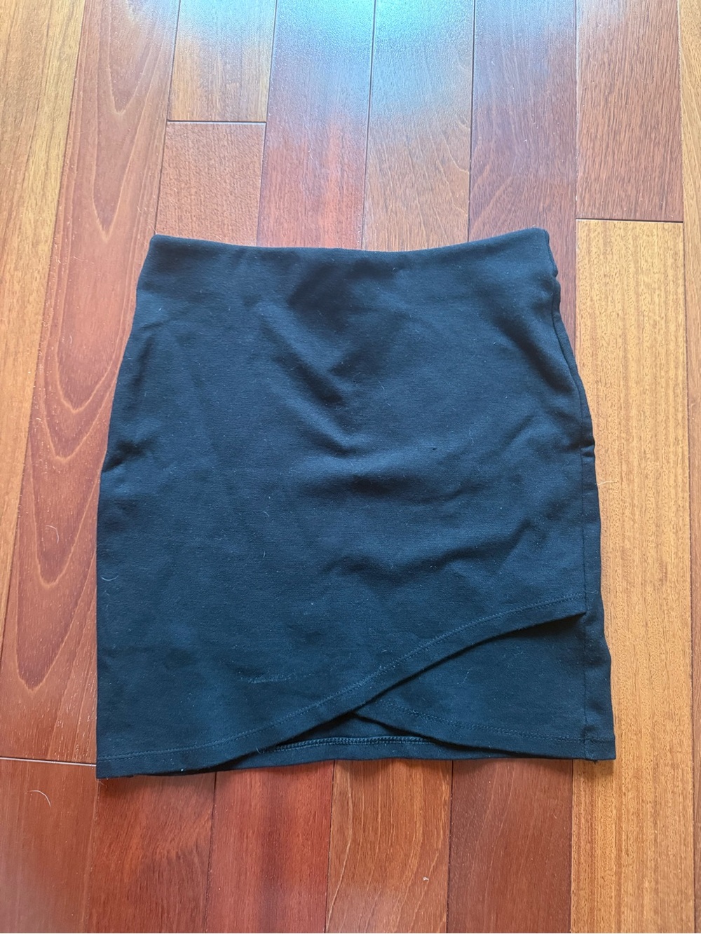 Aritzia Talula Black Wrap-Front Mini Skirt